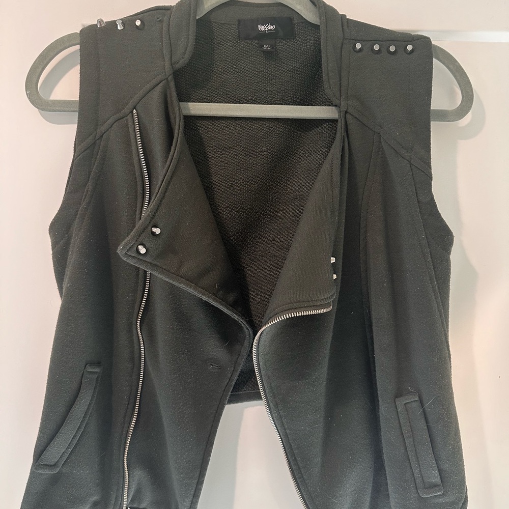 Green vest with stud detail